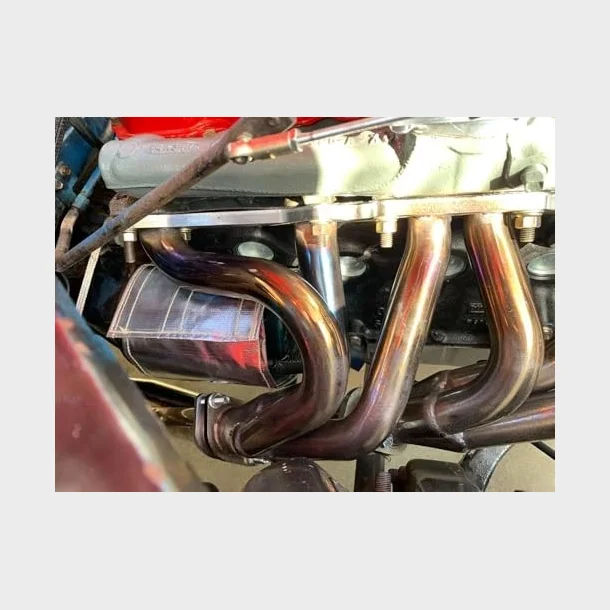 Isolering af starter (T�ler temperatur op til 2000 F)  Universal Starter heat shield 7 X 24 in Wrap Self Attaching